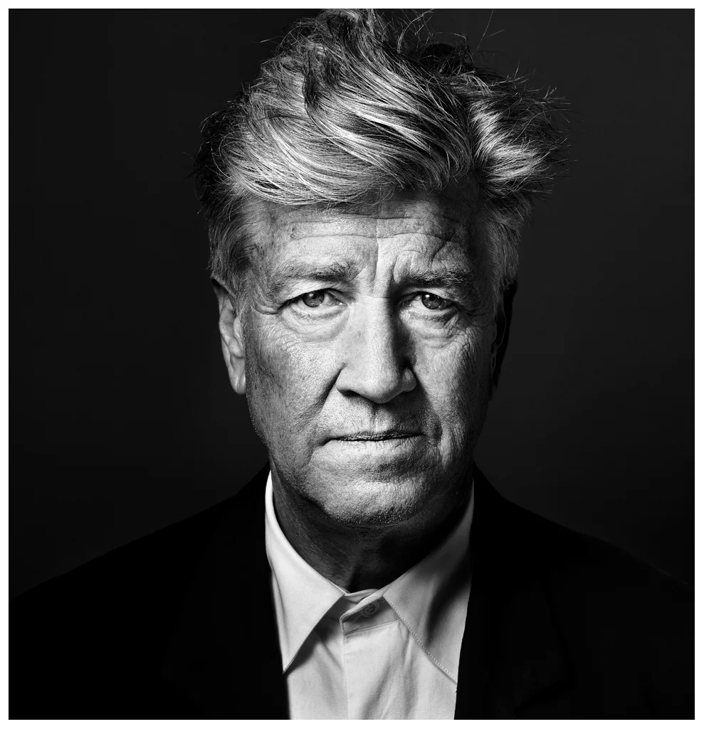 A stark black-and-white portrait of American filmmaker David Lynch, photographed by Marco Grob.