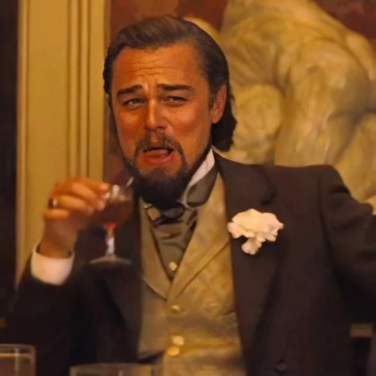 The definitive Leonardo DiCaprio laughing meme template.