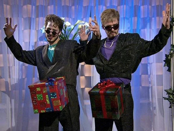 Justin Timberlake and Andy Samberg strike a signature pose during the 'Dick in a Box' musical sketch on Saturday Night Live.