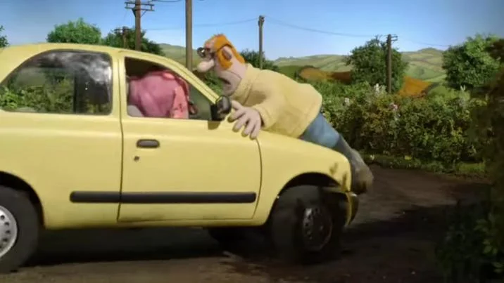 Fan-made recreation of dishub officer on car hood.