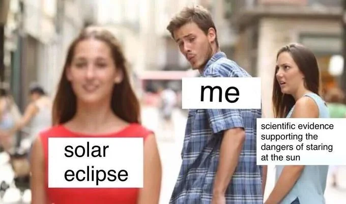 Solar eclipse topical Distracted Boyfriend meme.