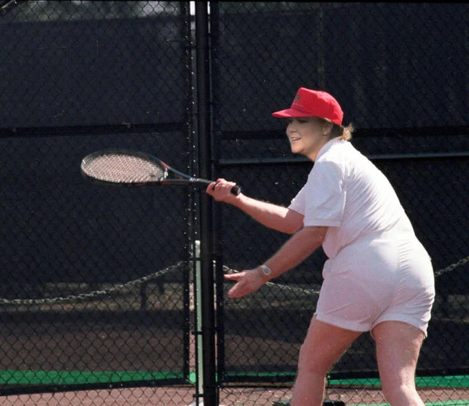A face-swapped remix of the viral Trump tennis photo circulated online.