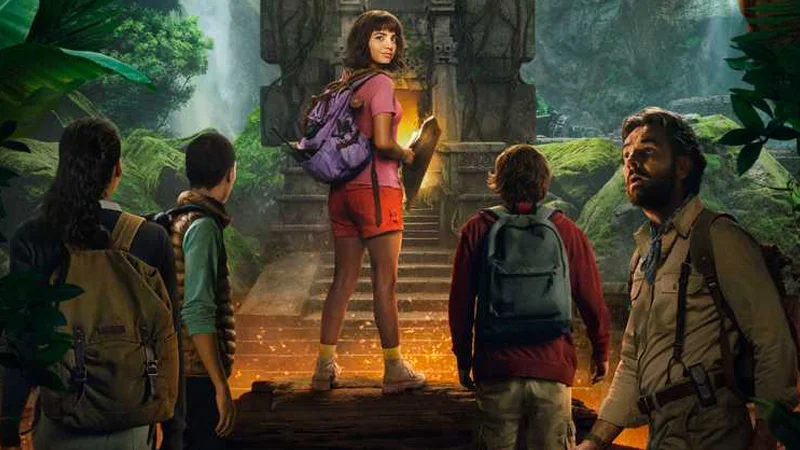 Promotional key art from the 2019 live-action film Dora and the Lost City of Gold, featuring the ensemble cast at a golden temple in the jungle.