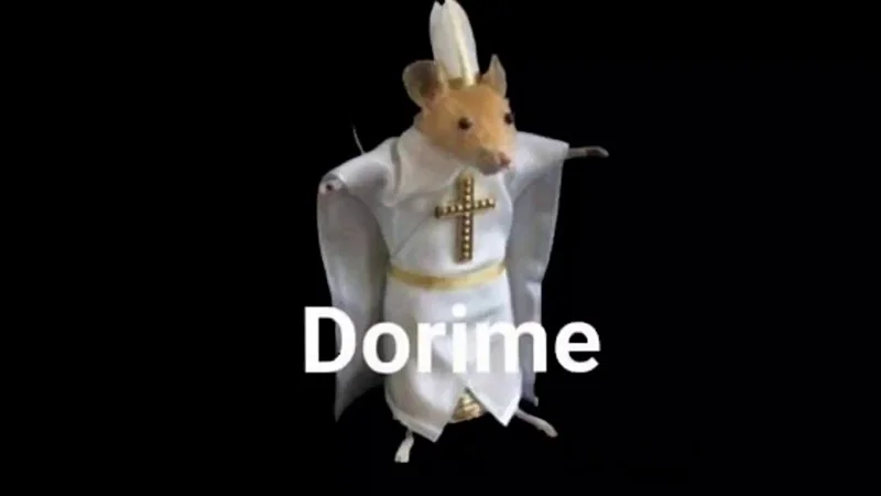 The iconic 'Dorime' rat image featuring a taxidermy mouse dressed in papal vestments, which became the viral face of the Dorime / Ameno Rat meme.