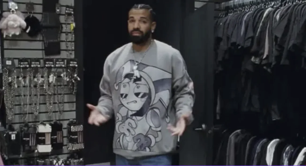 A still from Drake's FOMO livestream showing him wearing the now-viral Pomni graphic sweatshirt.