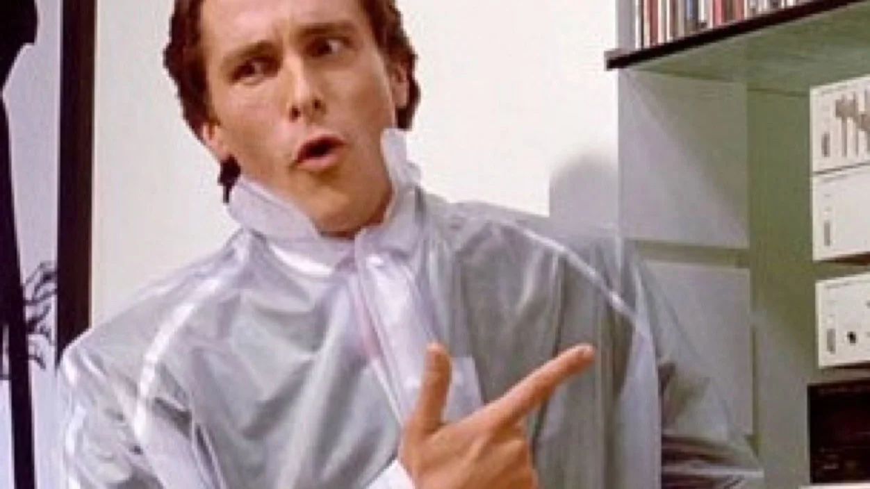 The signature 'Dubs Guy' image: Patrick Bateman pointing, used on 4chan to acknowledge repeating digits ('check 'em').