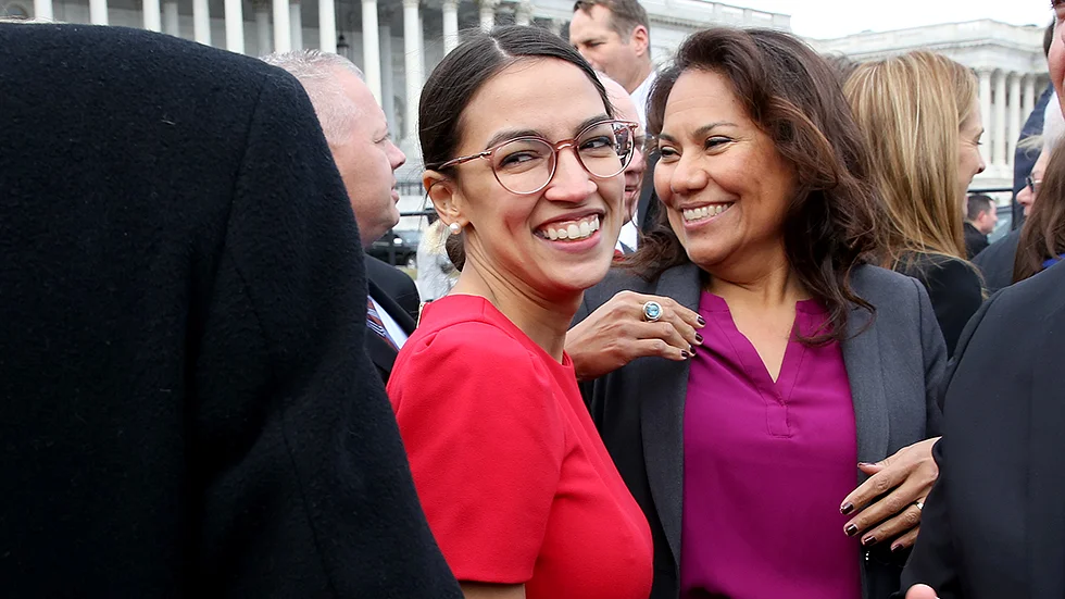 Alexandria Ocasio-Cortez photographed on Capitol Hill around the time of the November 2018 freshman congressional orientation that sparked Eddie Scarry's viral coat tweet.
