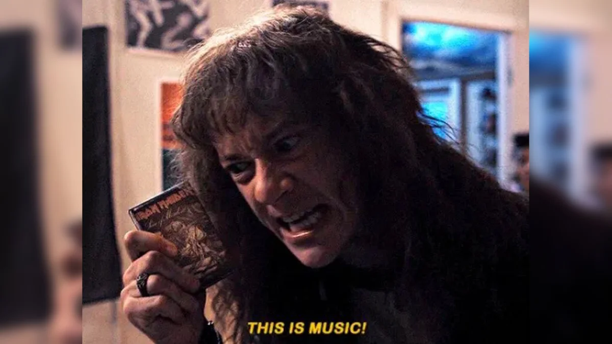 The source screencap from Stranger Things Season 4 where Eddie Munson passionately declares 'THIS IS MUSIC!' while presenting an Iron Maiden cassette.