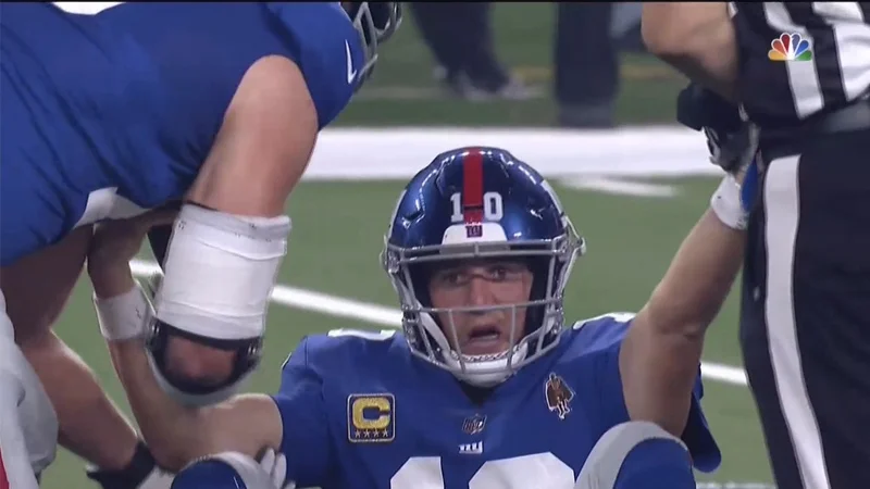 The original NBC broadcast frame of Eli Manning's exasperated reaction that became the meme's source image.