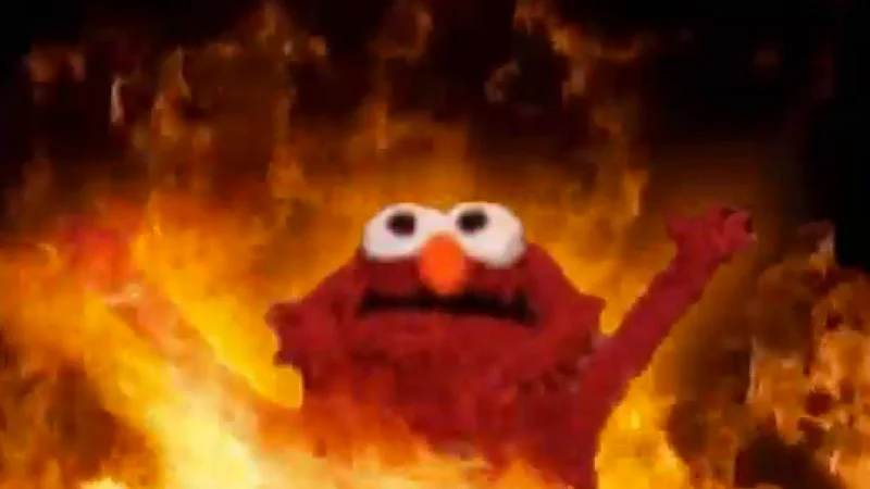 The original Elmo Rise still lifted from the 1999 'Elmo's World: Wild Wild West' sequence that became the meme's signature image.