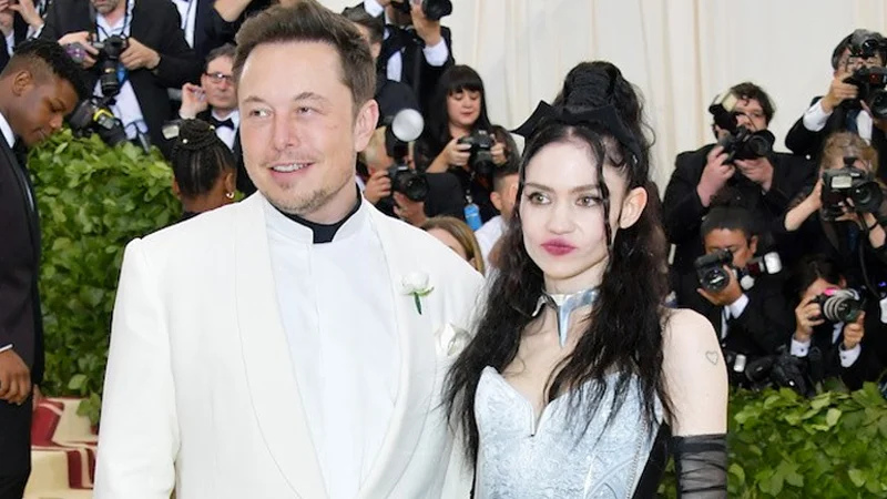 Elon Musk and Grimes make their public debut as a couple at the 2018 Met Gala, the photo that launched countless parody memes.