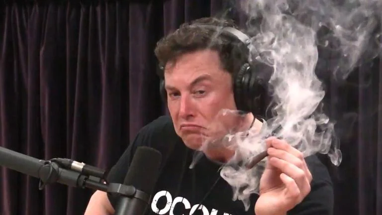 The now-iconic screenshot of Elon Musk smoking marijuana on the Joe Rogan Experience podcast, September 2018.