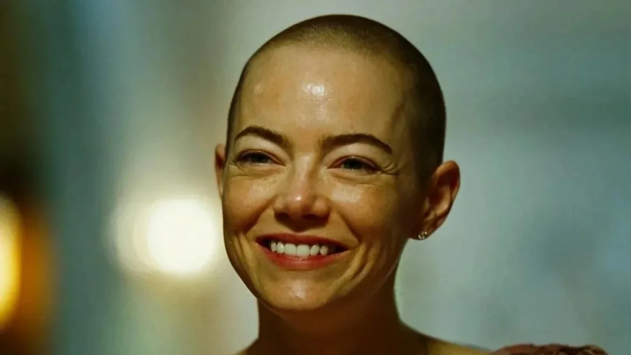 The source still from Yorgos Lanthimos' Bugonia (2025) that became the basis for the 'Emma Stone Smiling' reaction meme.