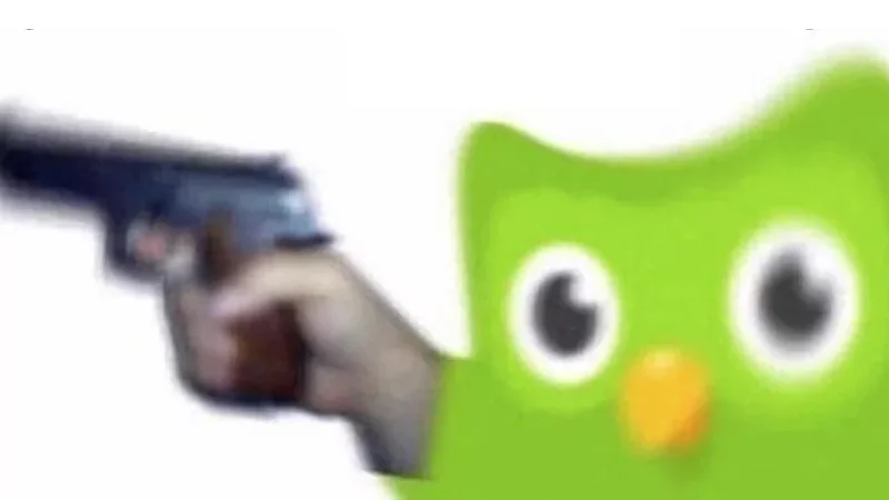 The iconic image of the Duolingo owl brandishing a pistol that launched the 'Evil Duolingo Owl' meme.