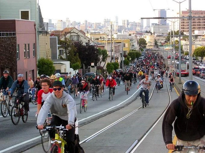 Critical Mass in San Francisco (April 29, 2005), a monthly cycling event often cited as a precursor to modern flash mob gatherings.