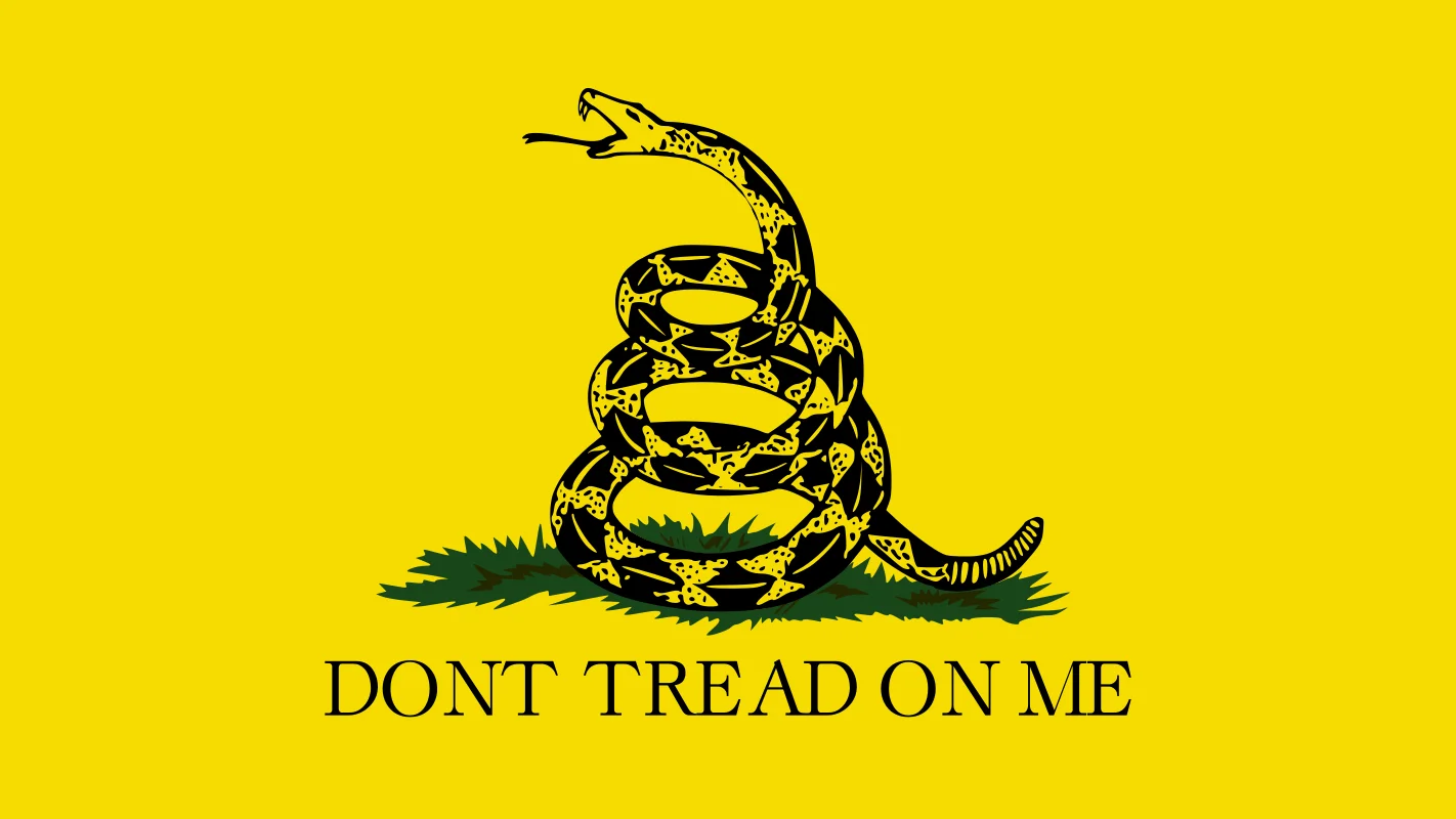 The original Gadsden flag, designed in 1775 during the American Revolution, depicts a coiled rattlesnake with the warning 'Dont Tread on Me.'