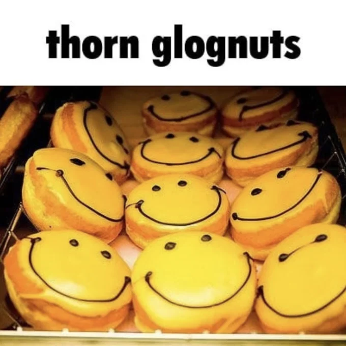 The 'thorn glognuts' image, a foundational Glaggleland visual depicting a tray of smiley-face donuts (the 'glognuts') that populate the fictional Glaggleland.