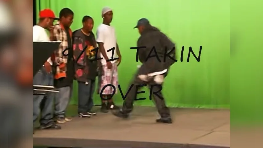 The iconic still from the '9/11 Takin Over' footwork video that became the basis for the 'God Bless the USA / 9/11 Footwerk Takin Over' meme.