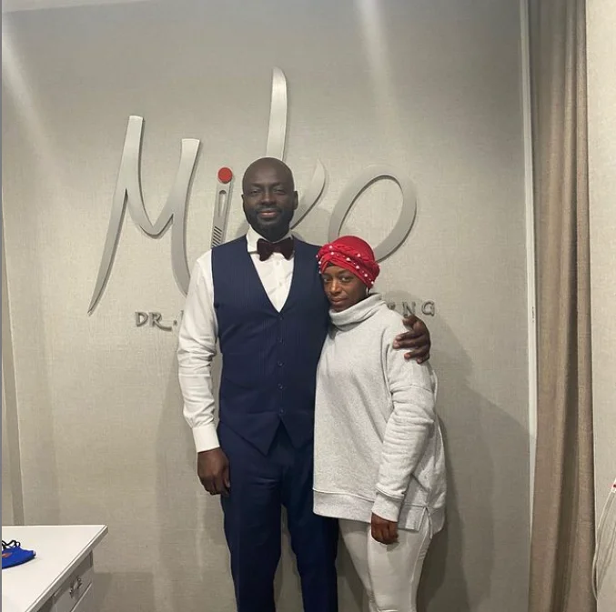 Tessica Brown poses with Beverly Hills plastic surgeon Dr. Michael Obeng, who performed the free glue removal procedure on her scalp.
