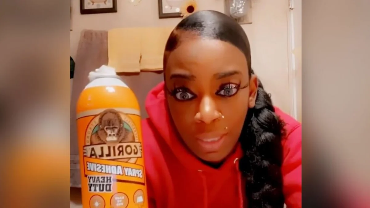 Tessica Brown holds up the Gorilla Spray Adhesive she used on her hair in her viral TikTok video that launched the 'Gorilla Glue Girl' meme.
