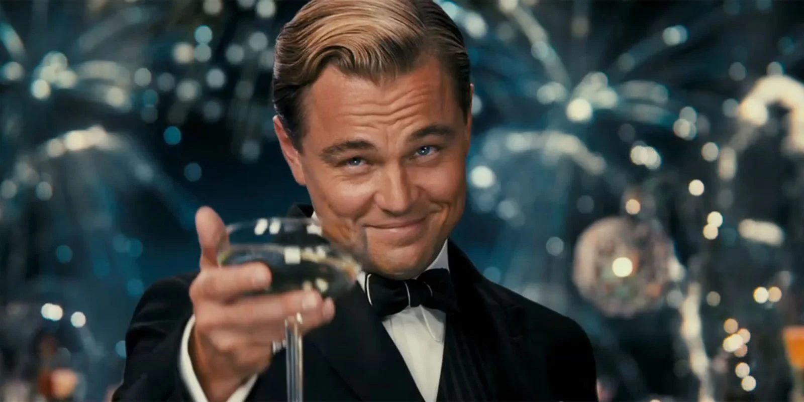 The iconic still from Baz Luhrmann's The Great Gatsby (2013) that launched the Leo Toasting reaction meme.