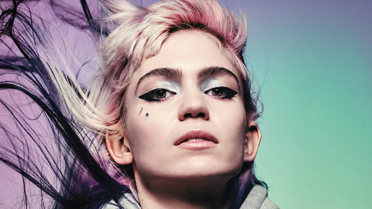 A stylized editorial portrait of Grimes, showcasing her signature avant-garde aesthetic.