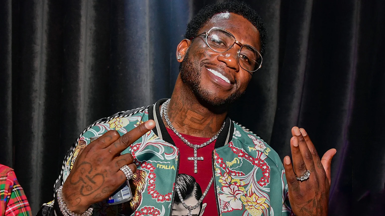 Rapper Gucci Mane, aka Guwop, photographed at a public event sporting his signature Gucci-branded fashion and iced-out jewelry.