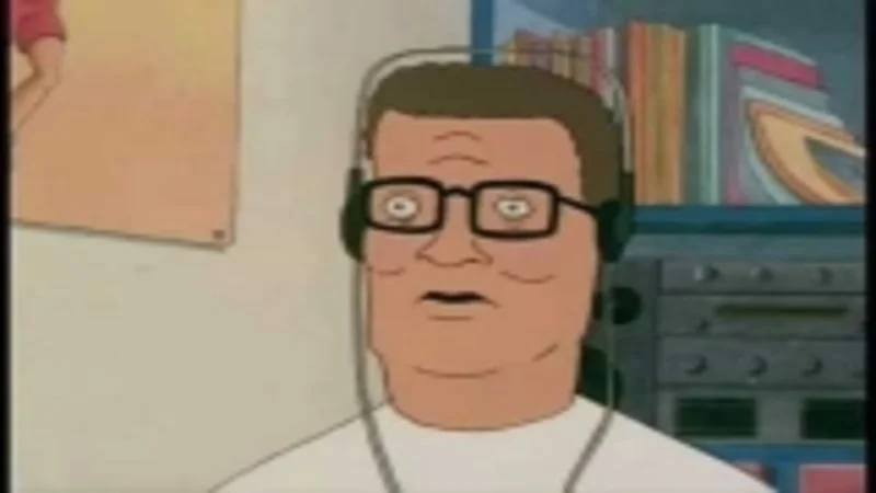The original screenshot of Hank Hill listening on headphones that spawned the 'Hank Hill Listens To X' meme format.