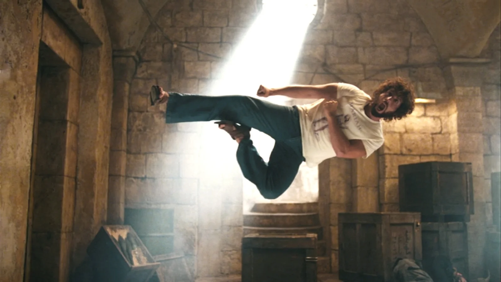 Screenshot from 'You Don't Mess with the Zohan' (2008), the source material for the meme's origin phrase describing Zohan as the greatest Israeli soldier the world has ever known.