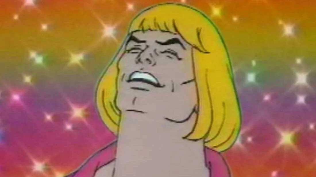 The signature He-Man singing frame set against a glittering rainbow backdrop, popularized by the viral 'What's Going On' music video edit.