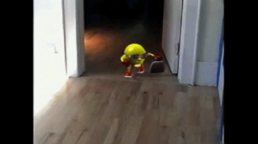 Animated GIF version of the viral Pac-Man toy footage that became the meme's iconic reaction image.
