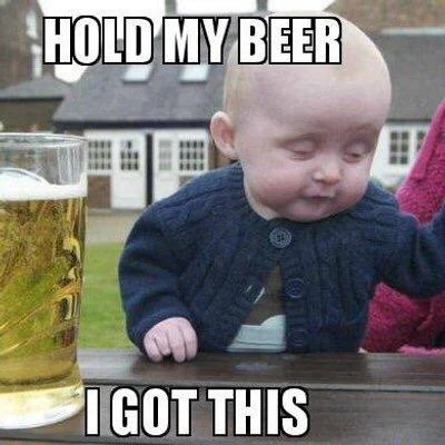 The iconic 'Drunk Baby' image macro featuring the phrase 'Hold My Beer, I Got This.'