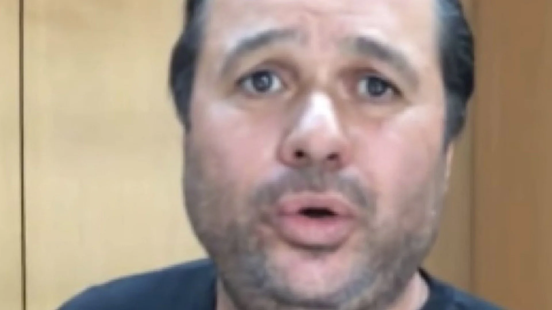 The iconic screenshot of Rudy Pantoja Jr. from the viral Seattle City Hall video that spawned the Hugh Mungus meme.