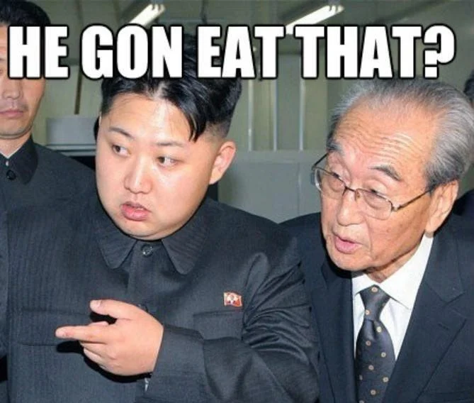 Extended crop of the 'He gon eat that?' Hungry Kim Jong-un meme showing Kim's pointing gesture.