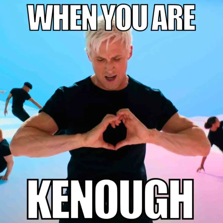 Ken expressing self-acceptance with heart gesture.
