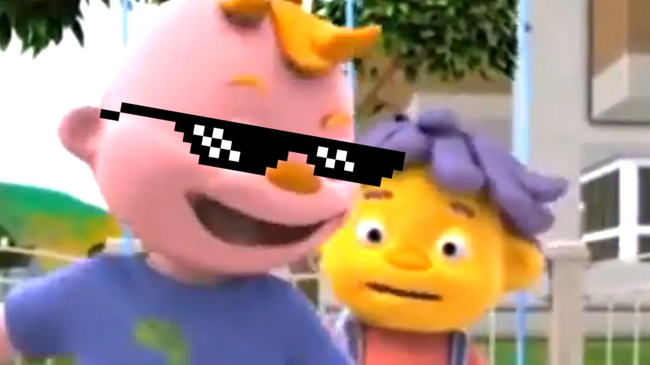 The iconic frame of Gerald from Sid the Science Kid, edited with 'deal with it' sunglasses, became the visual centerpiece of the 'I Am the One' meme.
