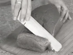 Bread crumbling during slicing demonstration.