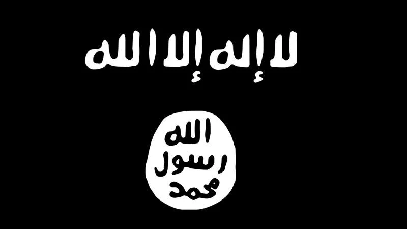 The black flag of the Islamic State (ISIS/Daesh), one of the most widely recognized symbols associated with the group.