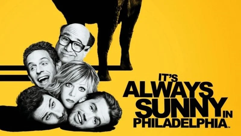 Official promotional key art for FX's 'It's Always Sunny in Philadelphia', featuring the show's core ensemble cast.
