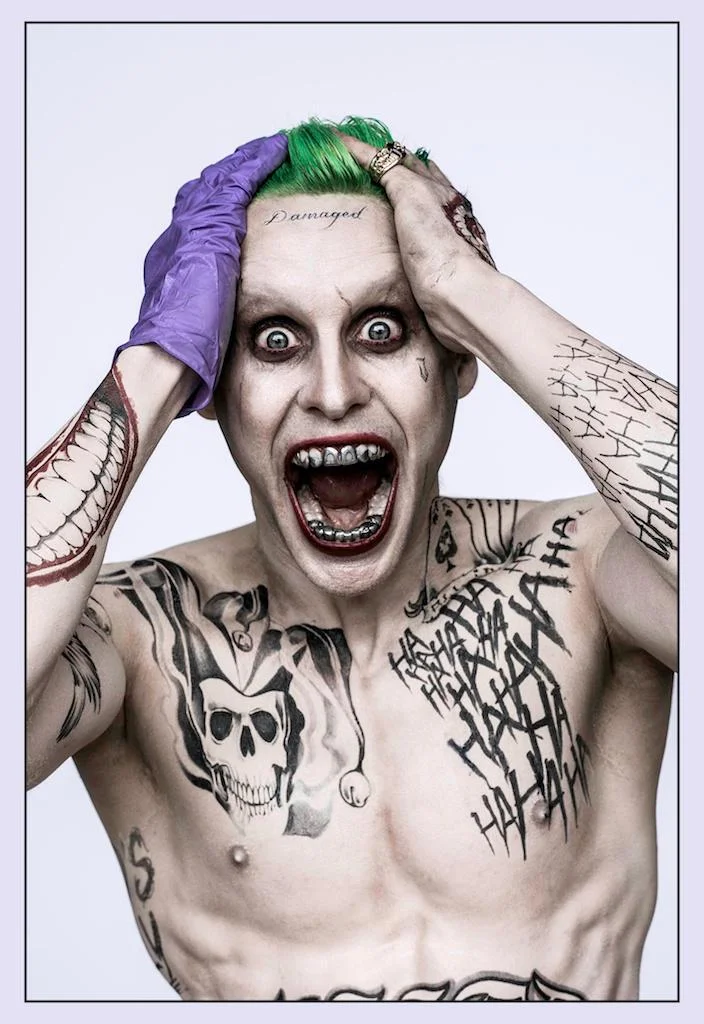 Paparazzi set photo of Jared Leto's Joker with Margot Robbie's Harley Quinn during production of Suicide Squad.