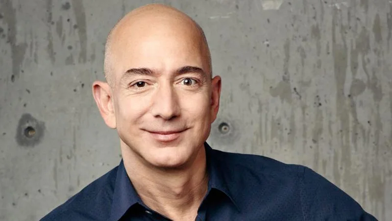 Official portrait of Amazon founder Jeff Bezos, the source photo behind many bald-daddy memes.