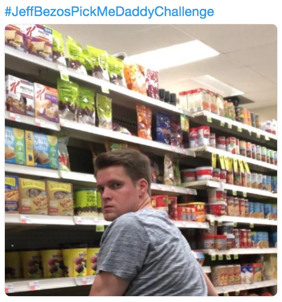 Another #JeffBezosPickMeDaddyChallenge submission, staging a candid grocery-store glance to court the newly-single billionaire.