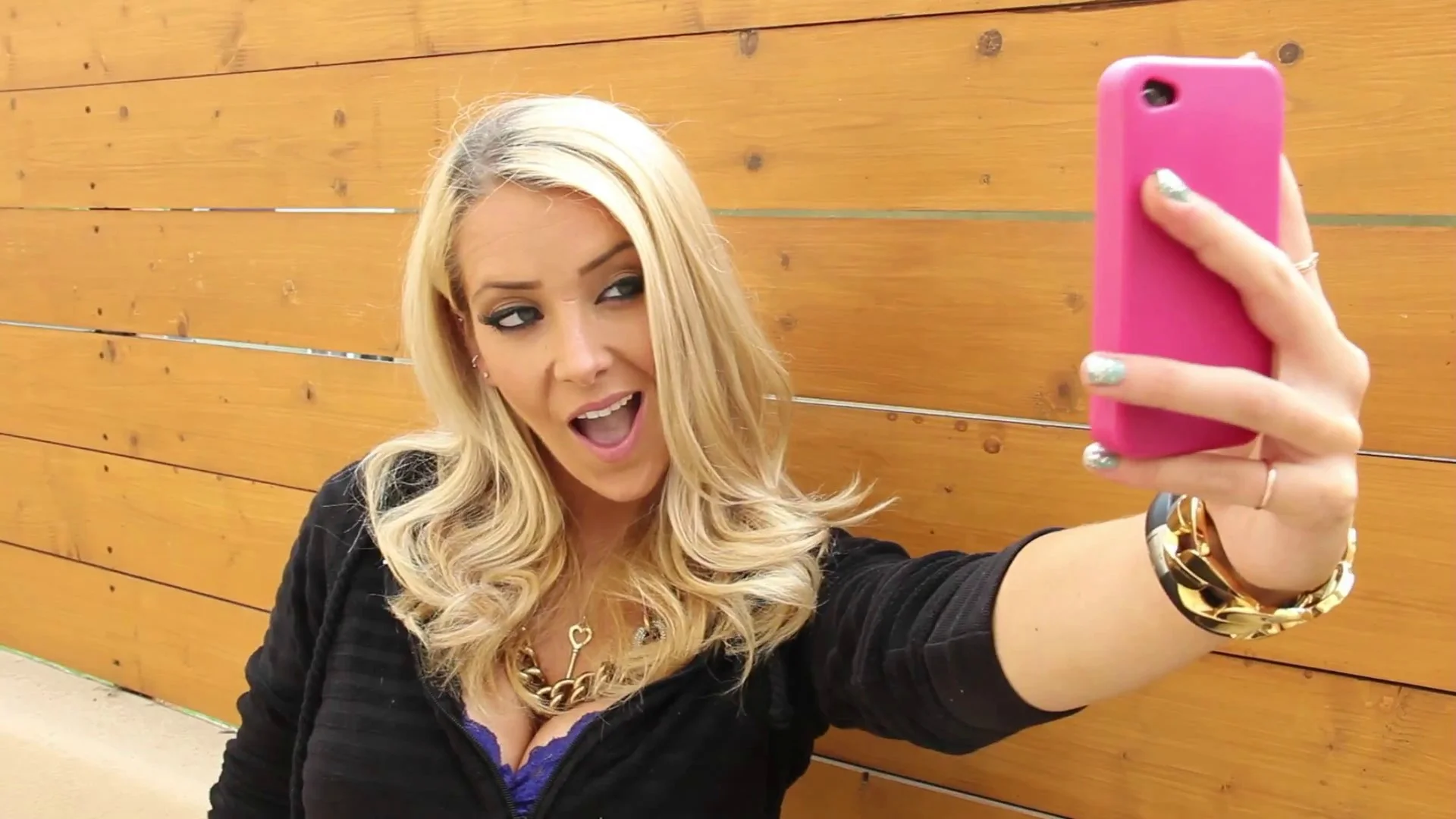 Jenna Marbles filming her signature comedy content, exemplifying her early-2010s YouTube aesthetic.