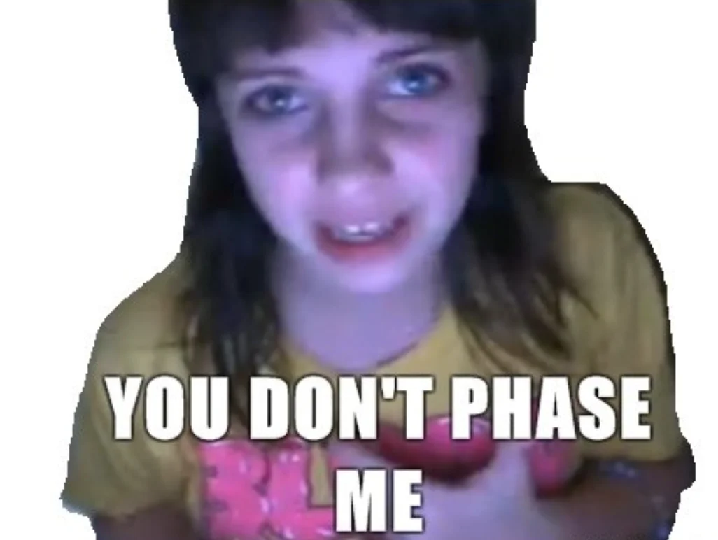 A meme still from Jessi Slaughter's original response video captioned with her famous quote 'You Don't Phase Me'.