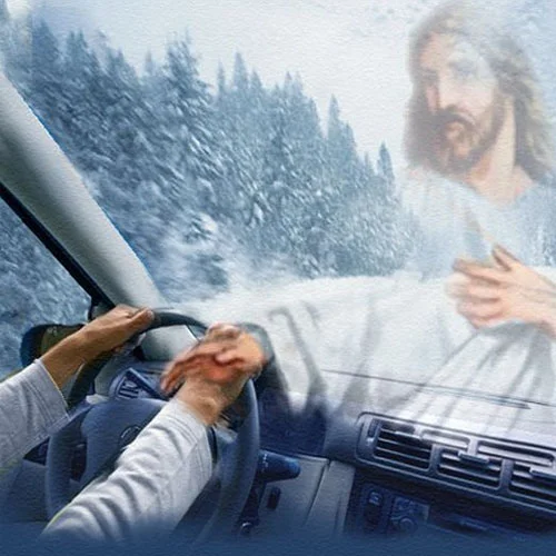 The iconic 'Jesus Take the Wheel' image depicting a driver relinquishing control of the vehicle to Jesus during dangerous driving conditions.