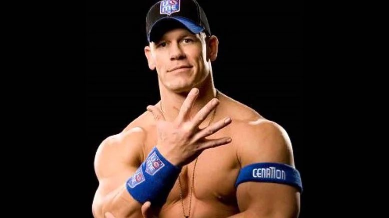The wrestler performing the gesture that originated the meme.