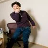 Individual recreating the theatrical JoJo's pose style.