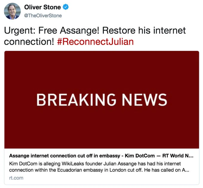 Protesters gather at the Ecuadorian Embassy in London as part of the #ReconnectJulian campaign after Assange's internet was cut.