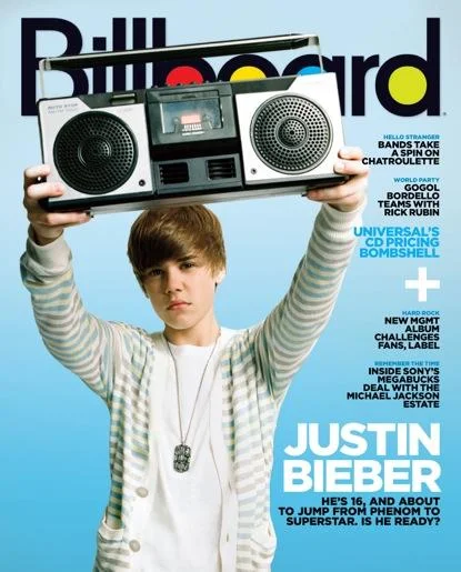 Justin Bieber's Billboard magazine cover from his early career, marking his transition from YouTube phenom to global superstar.