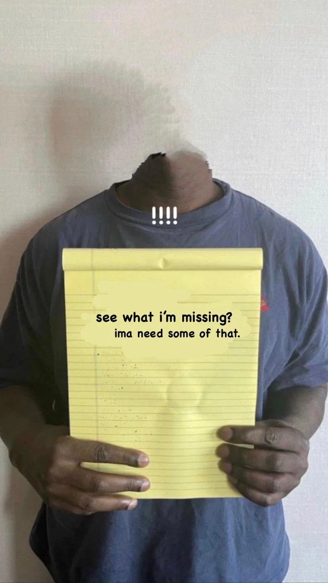 Kanye West Holding Notepad